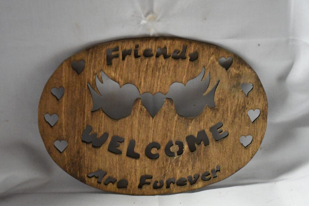 Handcrafted Wooden Welcome Sign with Heart Cutouts