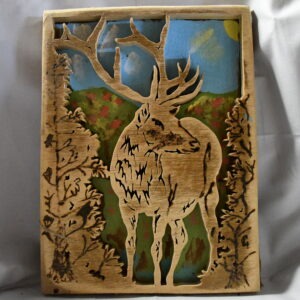 Deer in woods with background