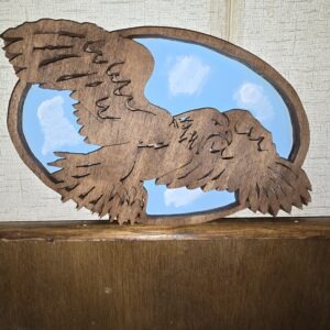 Eagle in flight with background