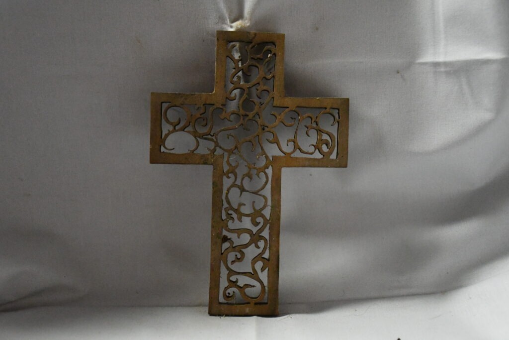 Handcrafted Wooden Cross with Intricate Scrollwork Design