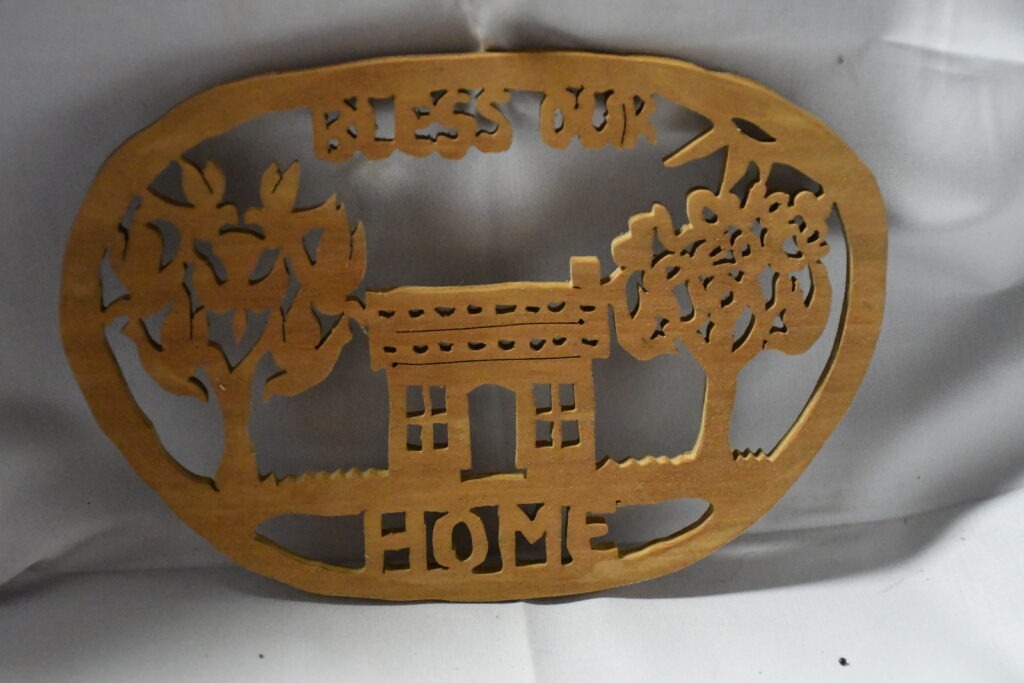 Handcrafted Wooden Wall Decor Featuring a House